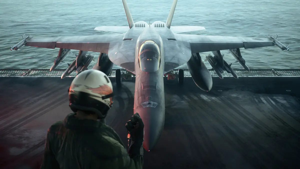 A pilot facing a fighter aircraft on an aircraft-carrier deck