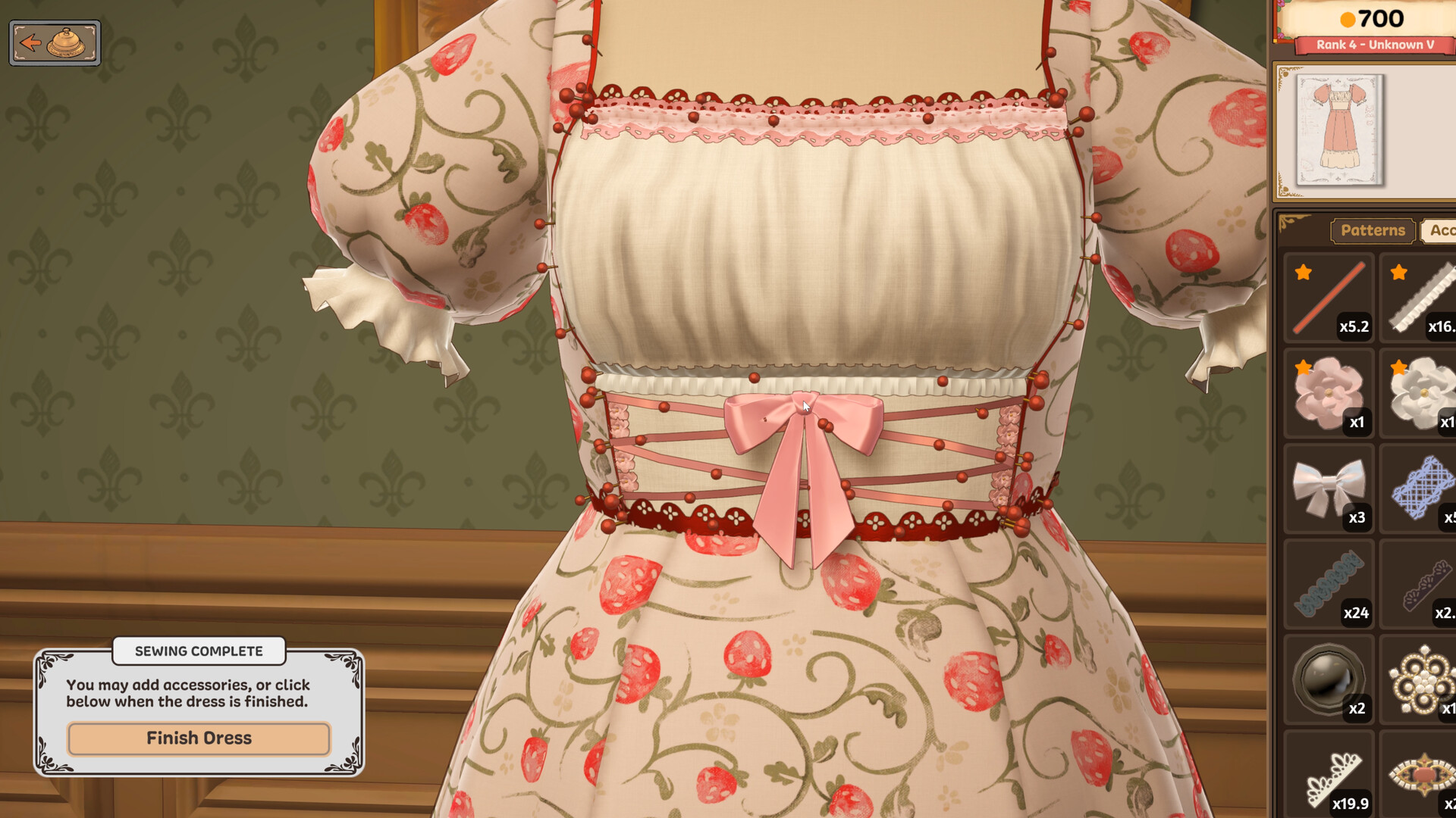 Official Dressmaker screenshot of a finished dress with the Sewing Complete notice and a Finish Dress button on screen, and the patterns and accessories panel open on the right