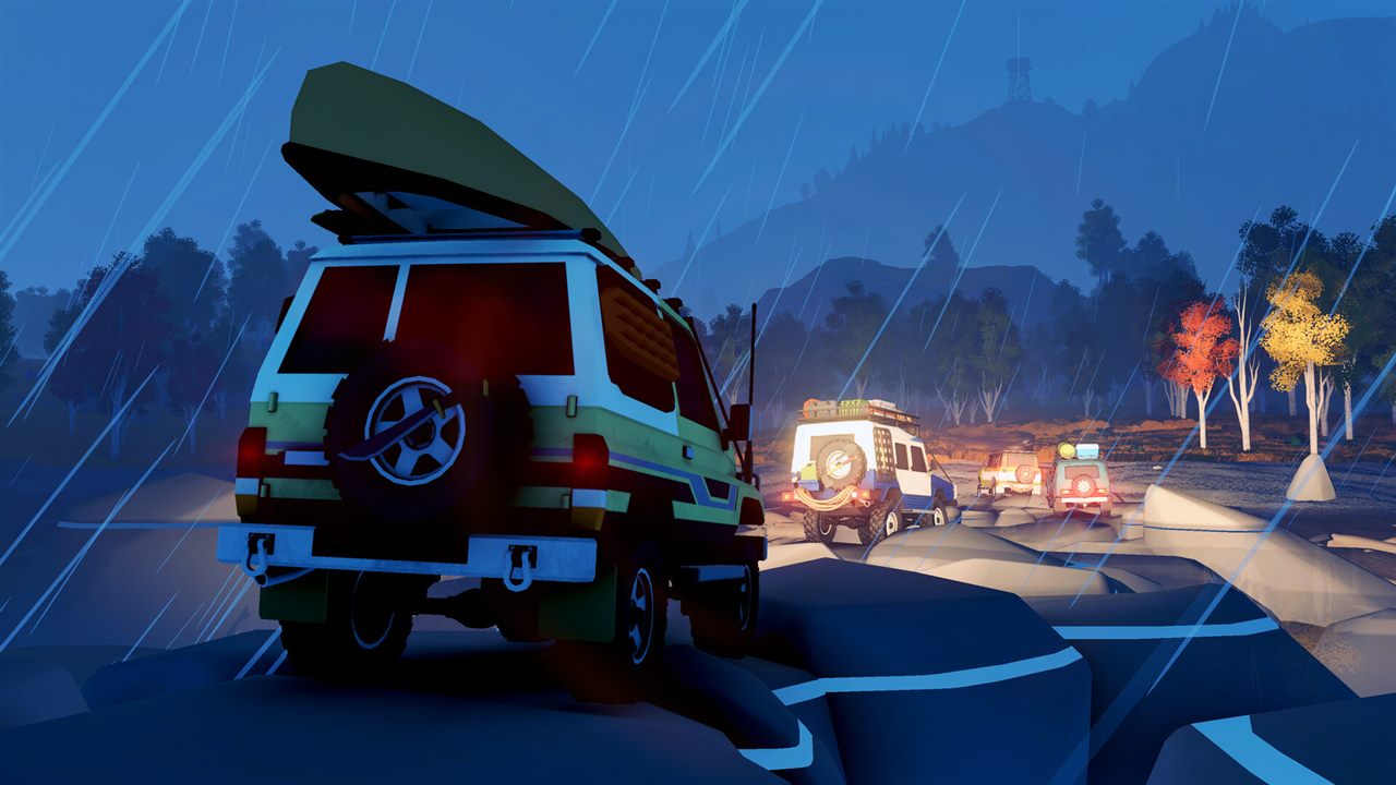 Official over the hill screenshot showing four off-road vehicles crossing rocky terrain in heavy rain