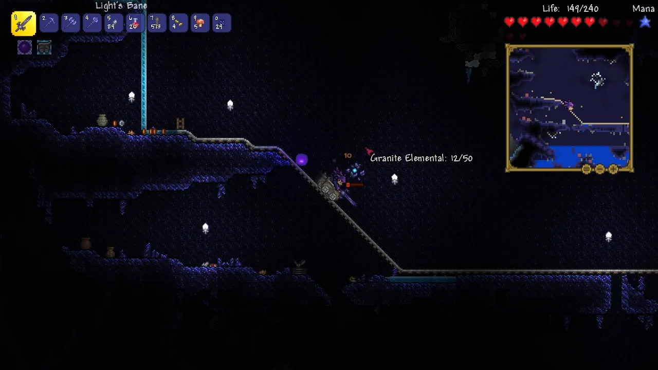 Official Terraria screenshot of a dark underground area with interface panels