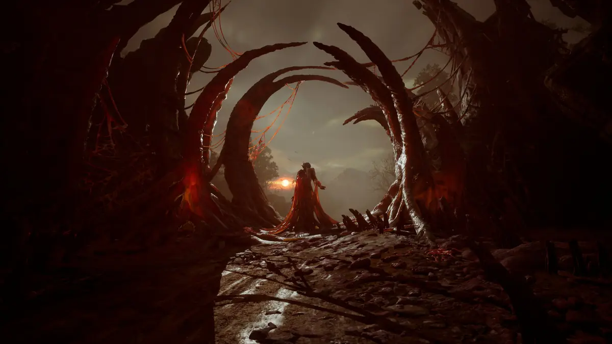 Official Valor Mortis screenshot of a cave passage lit in red