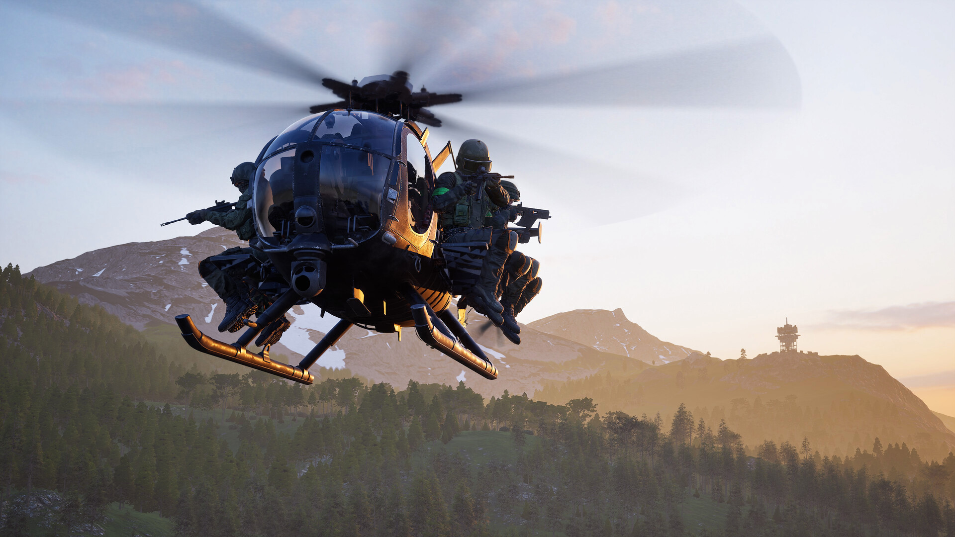 Official WARDOGS screenshot of a helicopter carrying soldiers over forested mountains at sunset